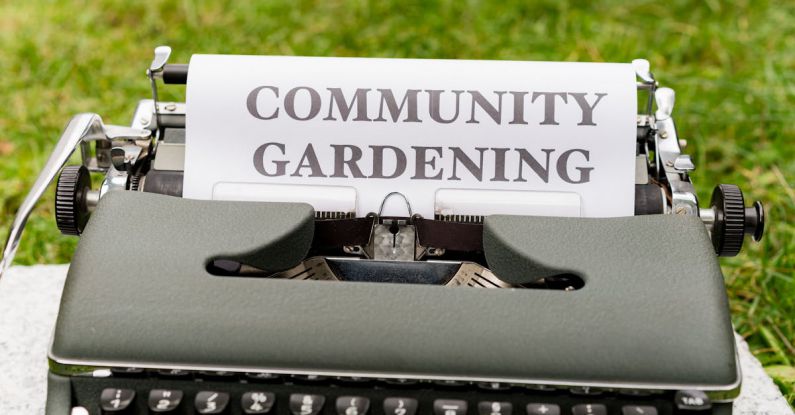 Permaculture - A typewriter with the words community gardening written on it